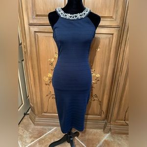 Very cute party dress, I’d keep it if it still fit.